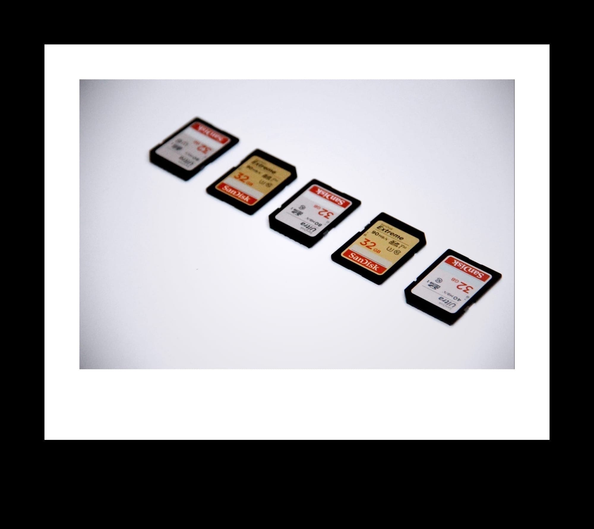 white and black nintendo game cartridge